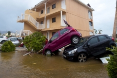 USVI Storm Damage Stacked Cars